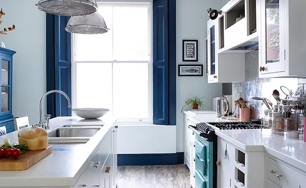 Newly remodeled open-concept kitchen with island cabinets and recessed lighting